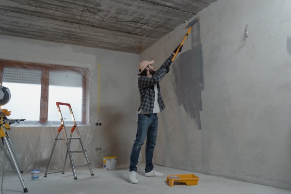 A man painting a wall