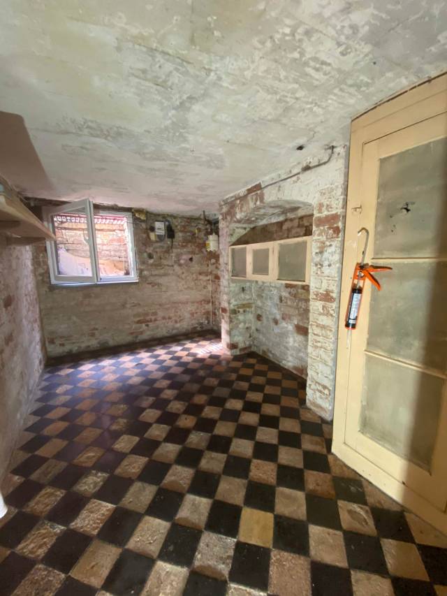 victorian basement cellar with underground window