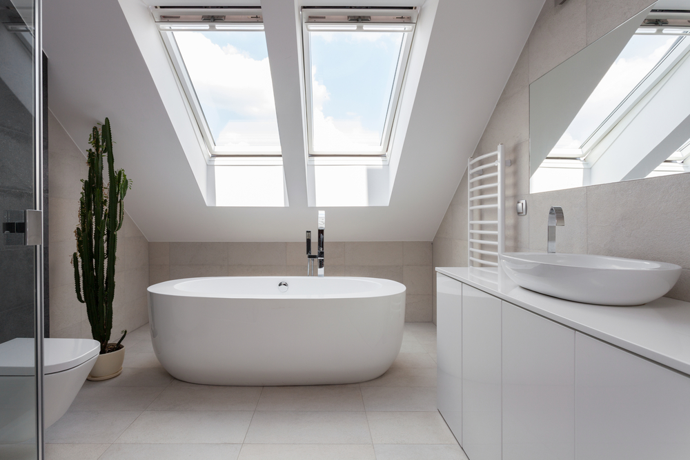 Modern bathroom with two large roof windows letting in light