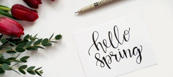 paper and pen for writing spring renovation ideas for your home