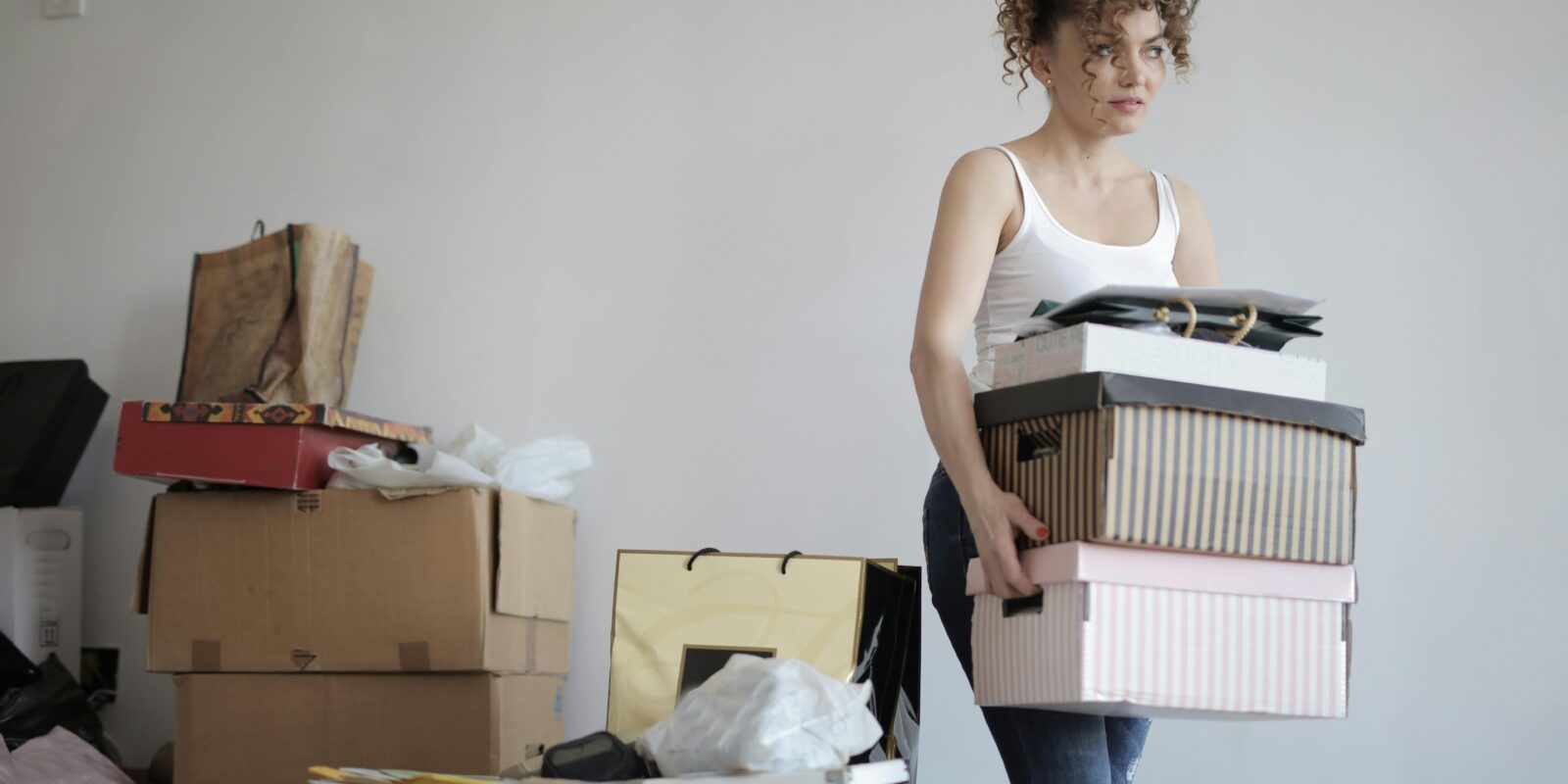 a woman moving out alone after divorce.