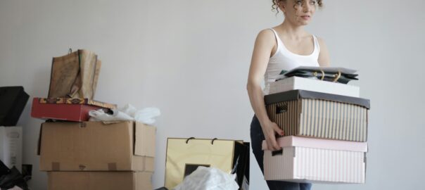 a woman moving out alone after divorce.